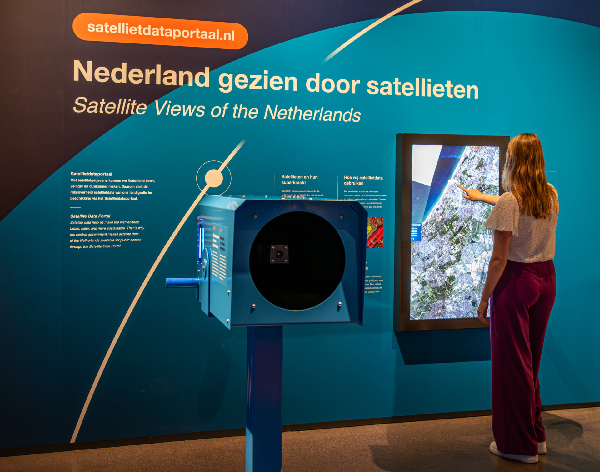 Student interacting with a screen at Space Expo in Noordwijk, Netherlands. Credit: Noordwijk Space Expo