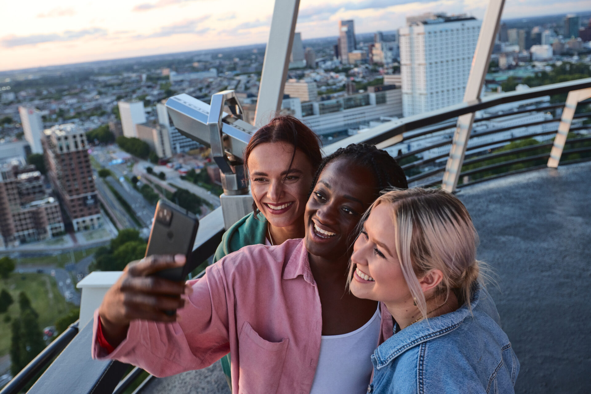 Students taking a selfie at the Euroscope tower in Rotterdam, Netherlands